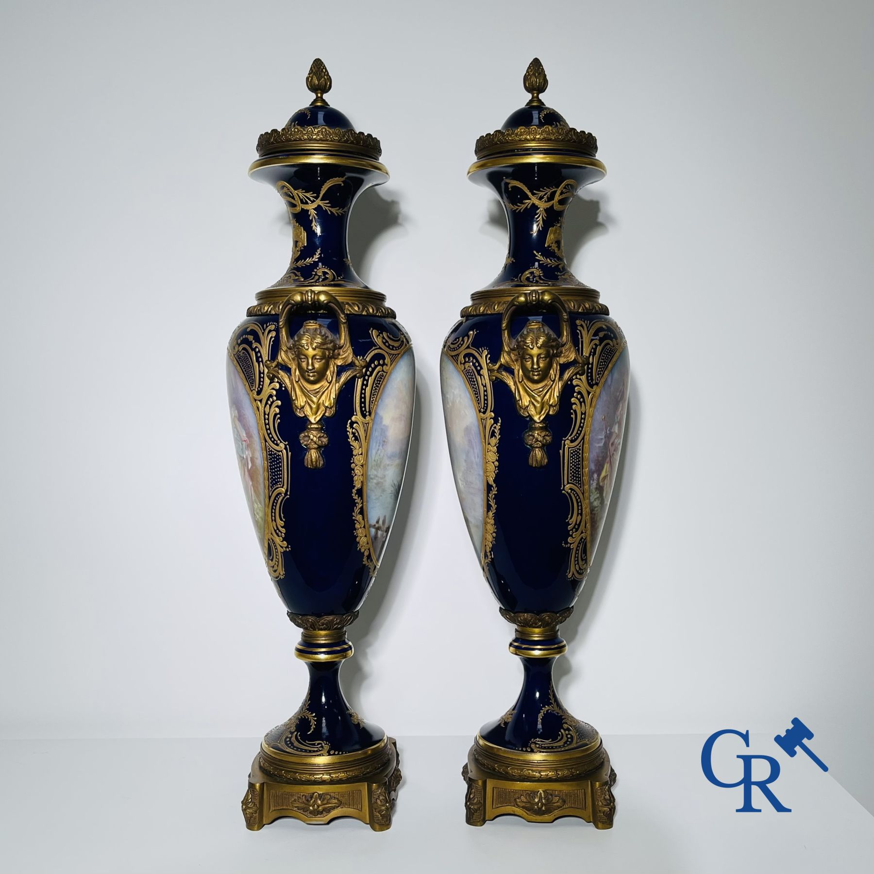 Porcelain: Sèvres: Pair of large bronze mounted vases in Sevres porcelain.