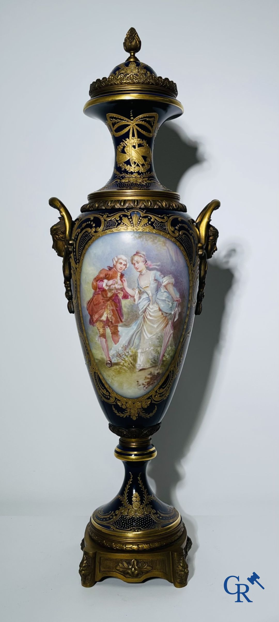 Porcelain: Sèvres: Pair of large bronze mounted vases in Sevres porcelain.