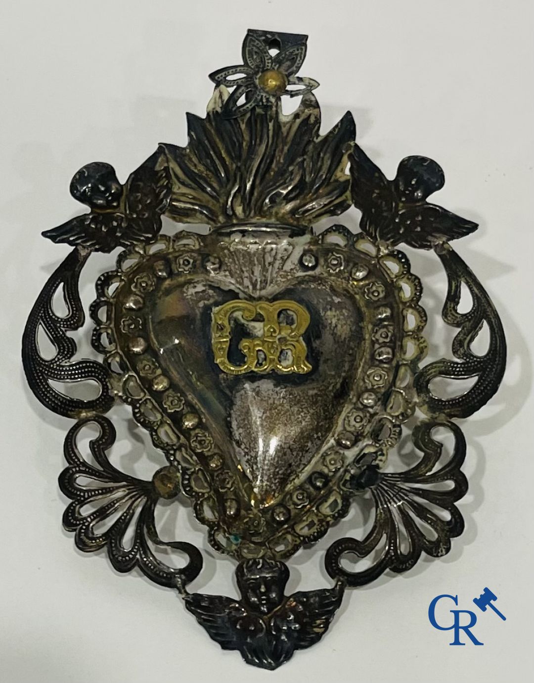 A lot of 9 pieces of various religious objects in silver. 18th-19th century