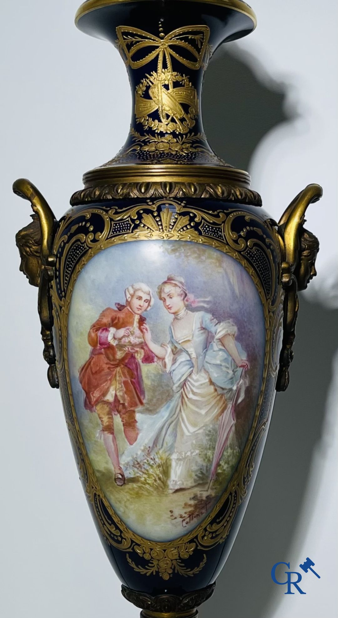 Porcelain: Sèvres: Pair of large bronze mounted vases in Sevres porcelain.