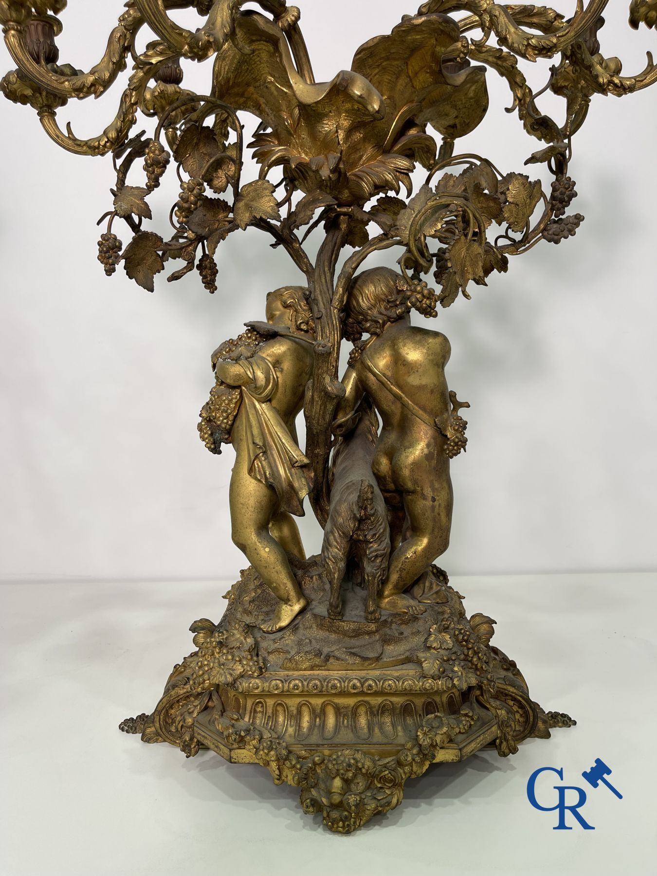 A pair of imposing bronze candlesticks with putti in LXVI style. Napoleon III period.