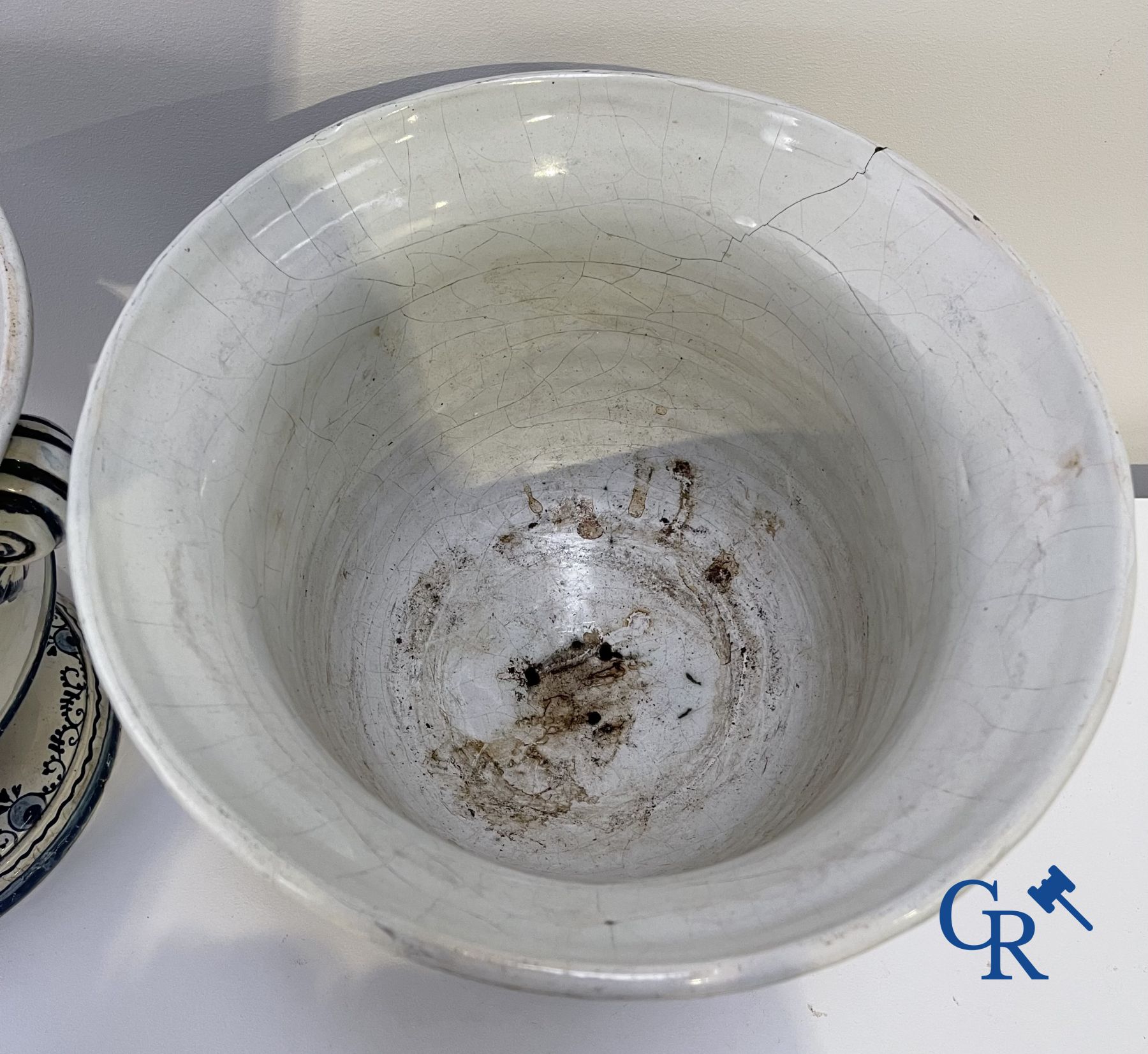 Delft: 11 pieces of blue and white faience with different décors. 17th - 18th century.