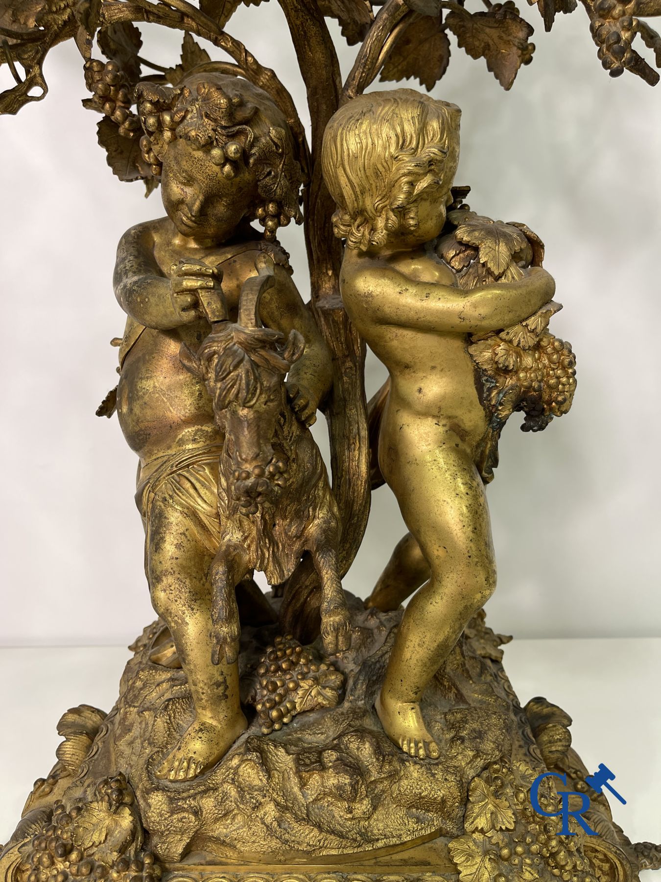 A pair of imposing bronze candlesticks with putti in LXVI style. Napoleon III period.