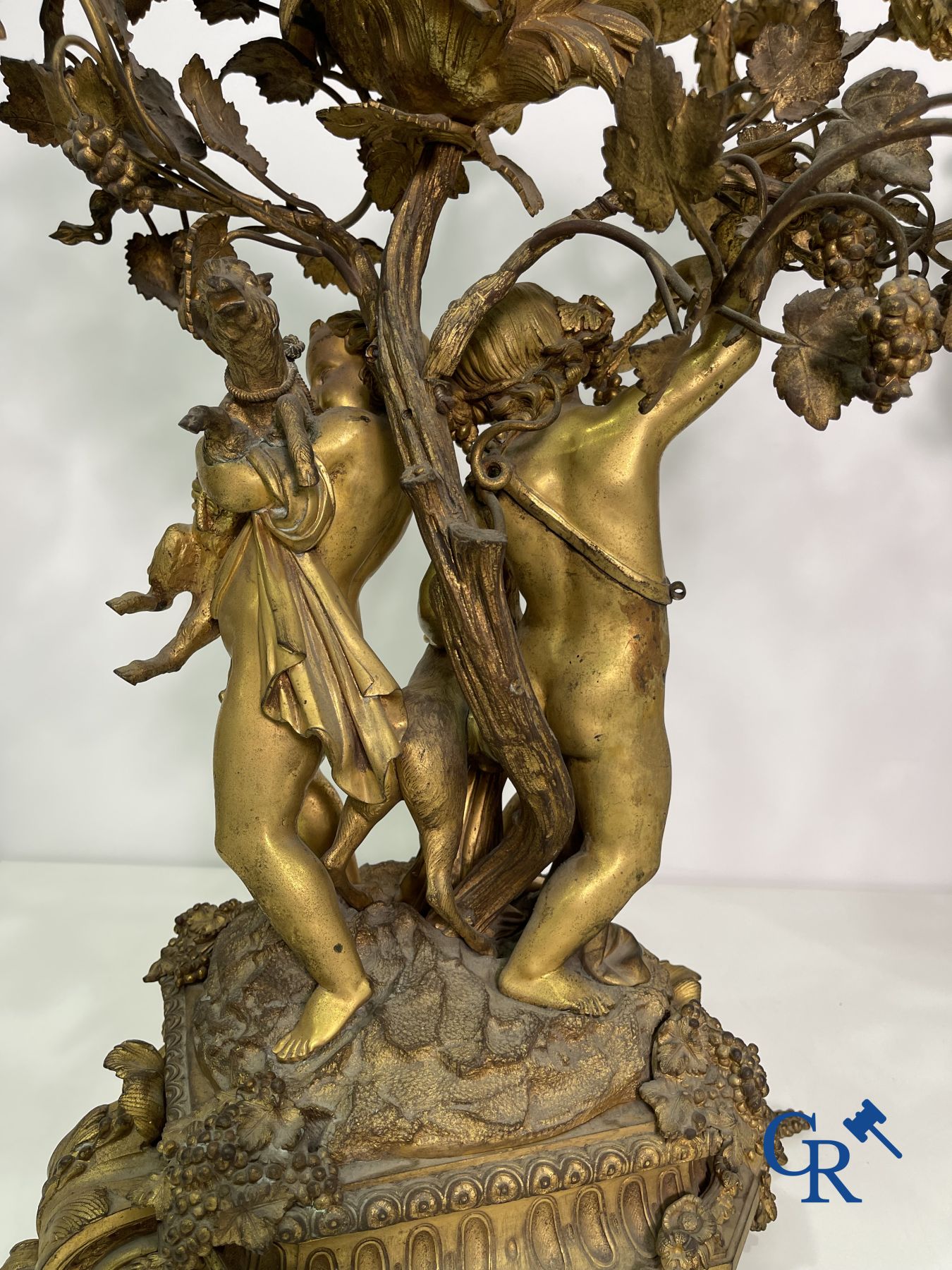 A pair of imposing bronze candlesticks with putti in LXVI style. Napoleon III period.