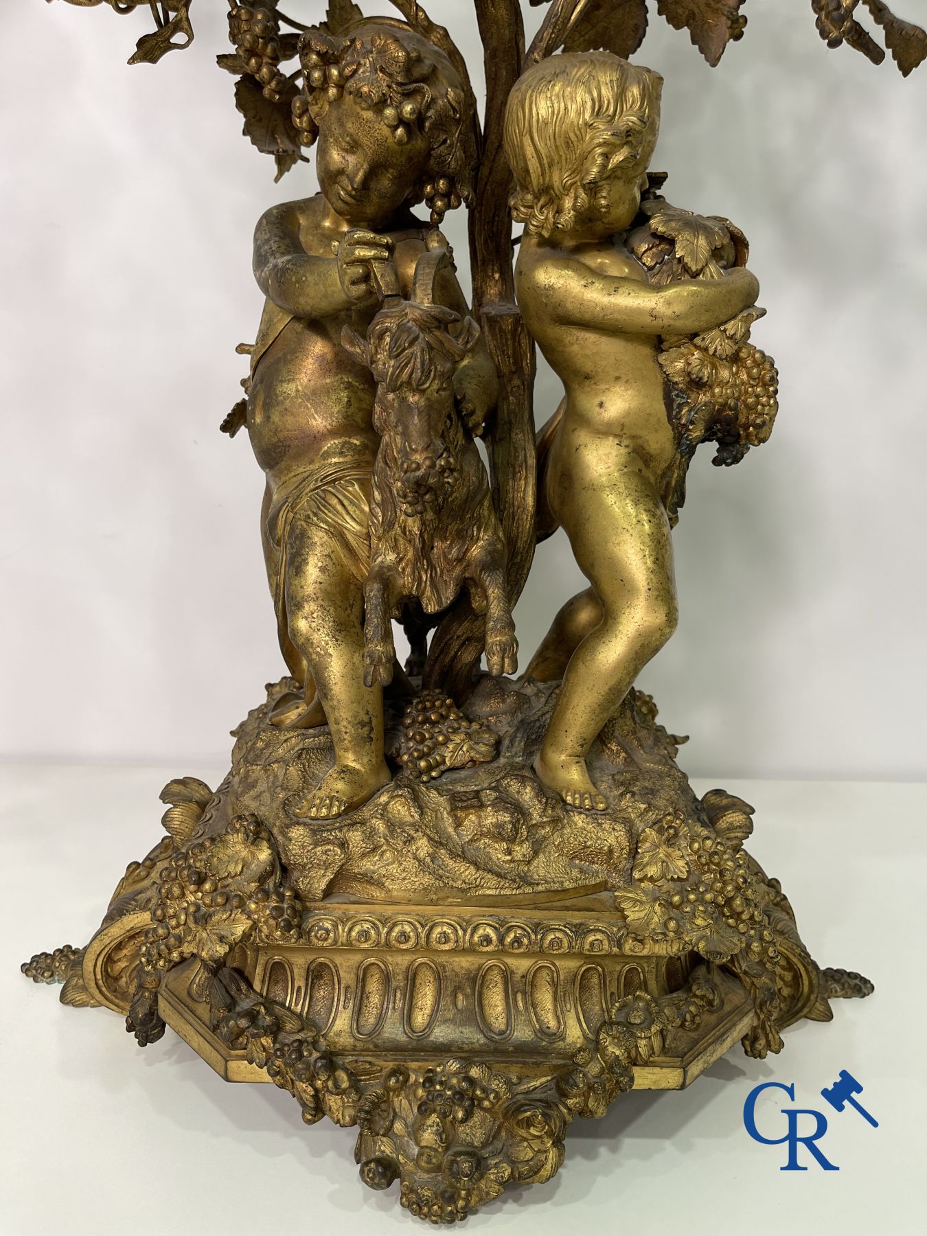 A pair of imposing bronze candlesticks with putti in LXVI style. Napoleon III period.