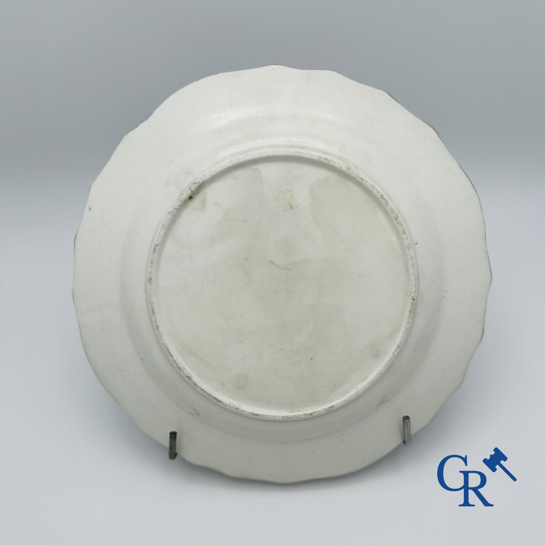 Plate in blue tinted Doorniks Porcelain. (pâte tendre) 18th century.