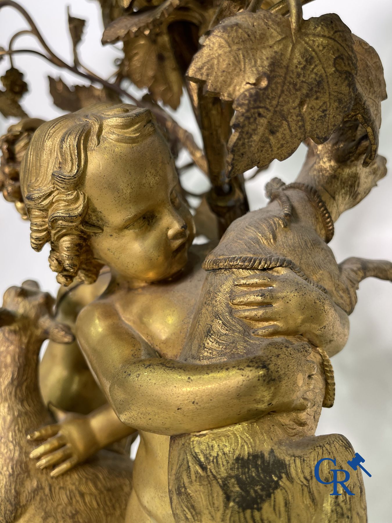 A pair of imposing bronze candlesticks with putti in LXVI style. Napoleon III period.