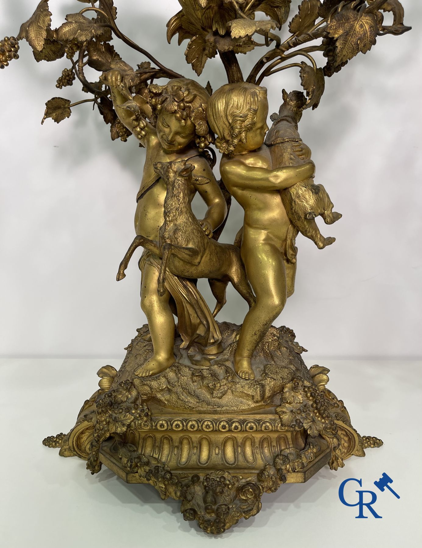 A pair of imposing bronze candlesticks with putti in LXVI style. Napoleon III period.