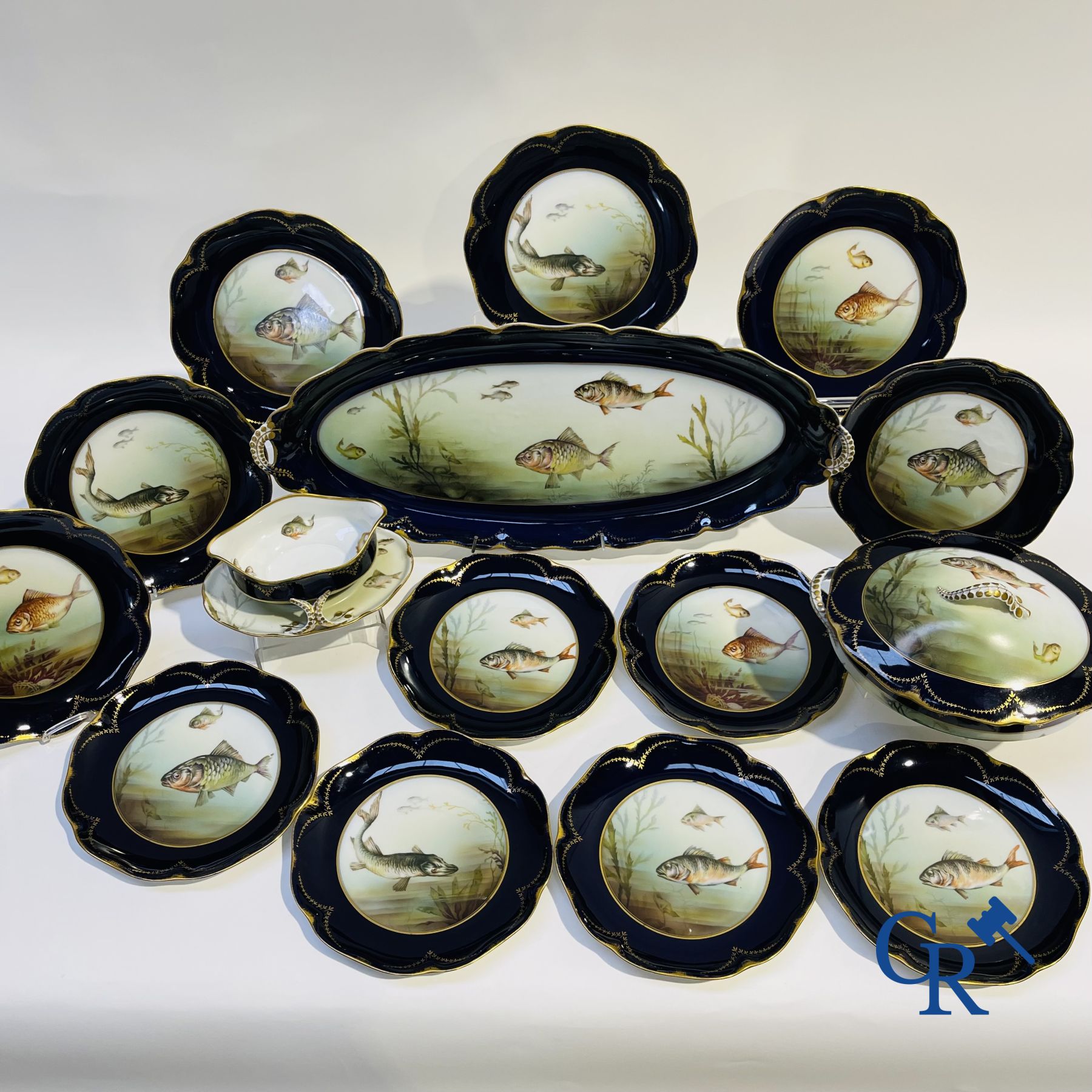 Porselein: Tafelservies met een decor van vissen in Rosenthal porselein.